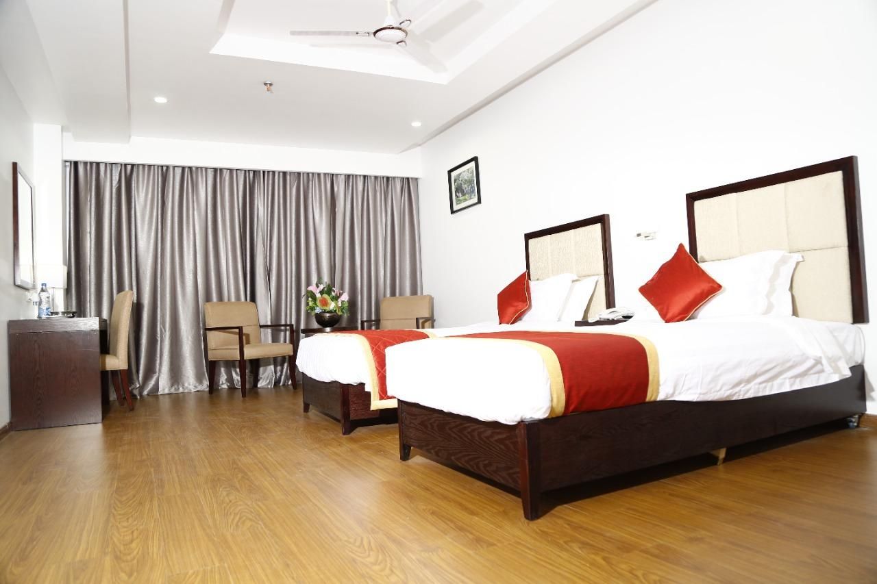 Triguna Clarks Inn, Kurnool Premium Twin Room 3