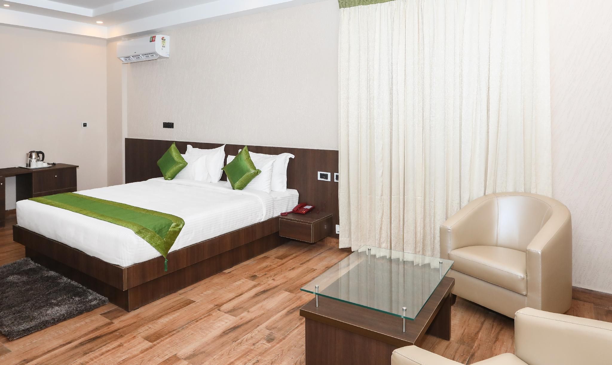 Treebo Durga Boji Grand, Gonikoppal Town Deluxe Double Room 16