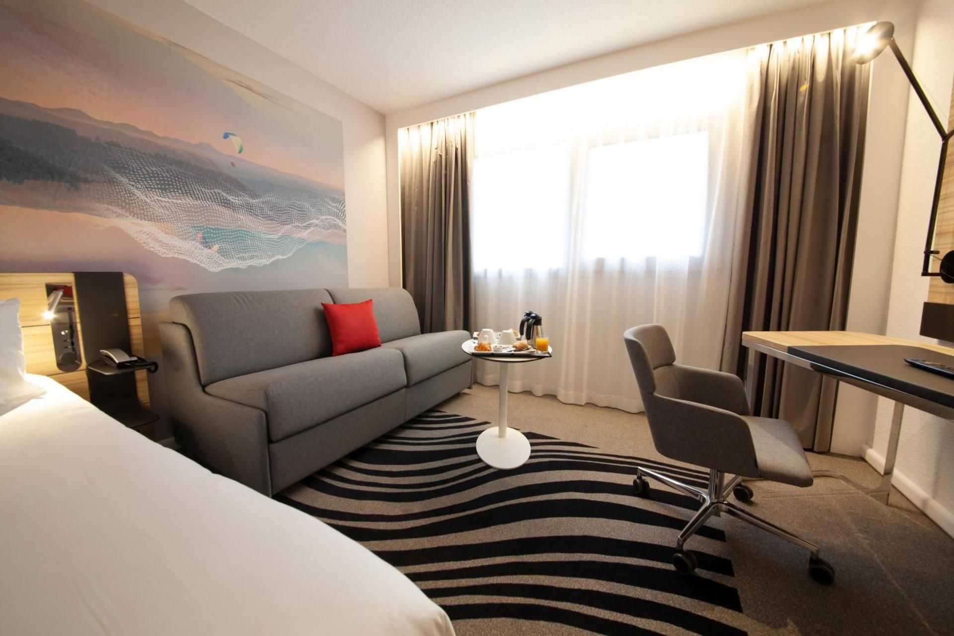 Superior room w/ a double bed & sofa that can b e converted into double bed