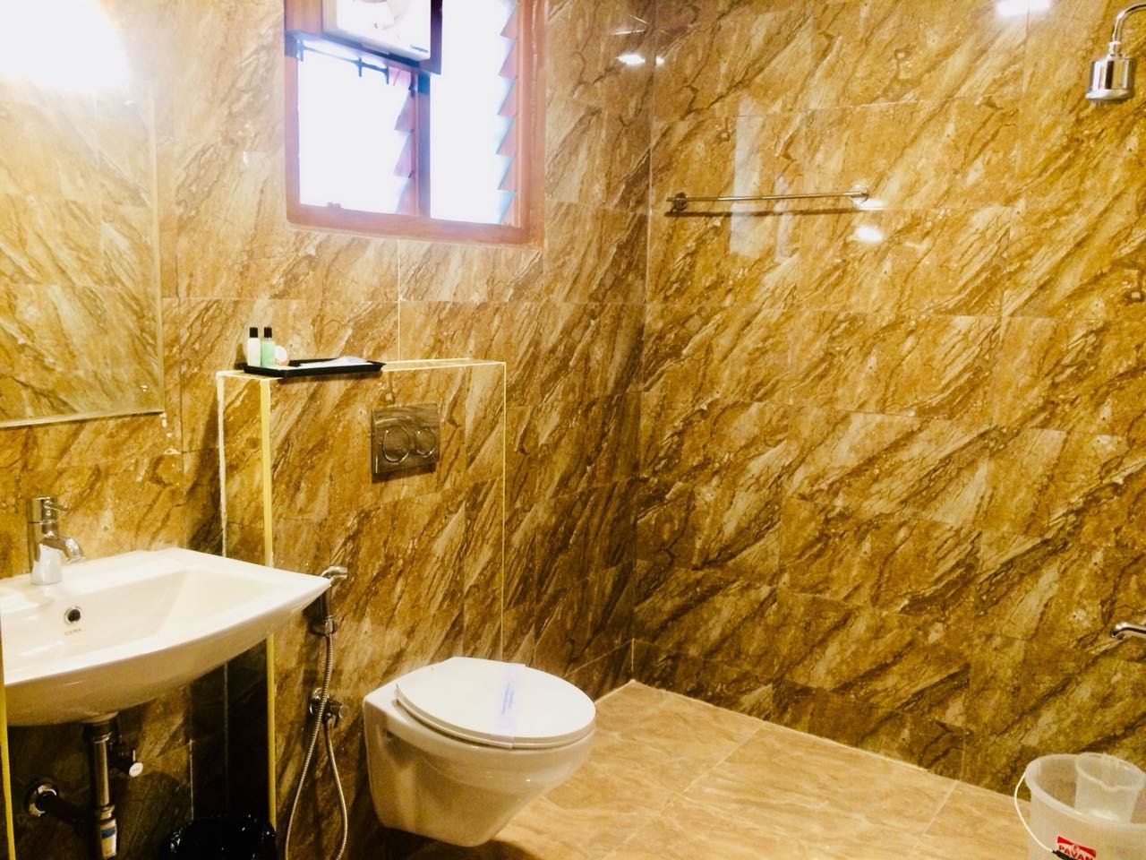 Poppys Tower Tiruppur Superior Double Room 4
