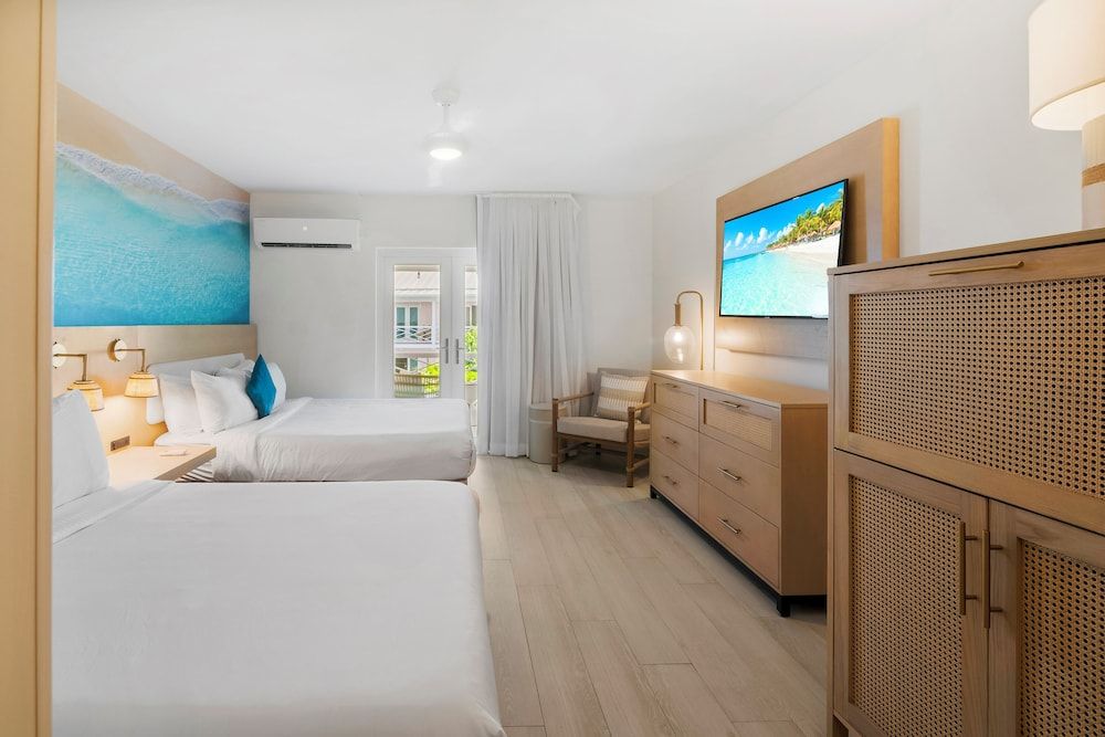 Room, 2 Queen Beds, Balcony, Partial Ocean View