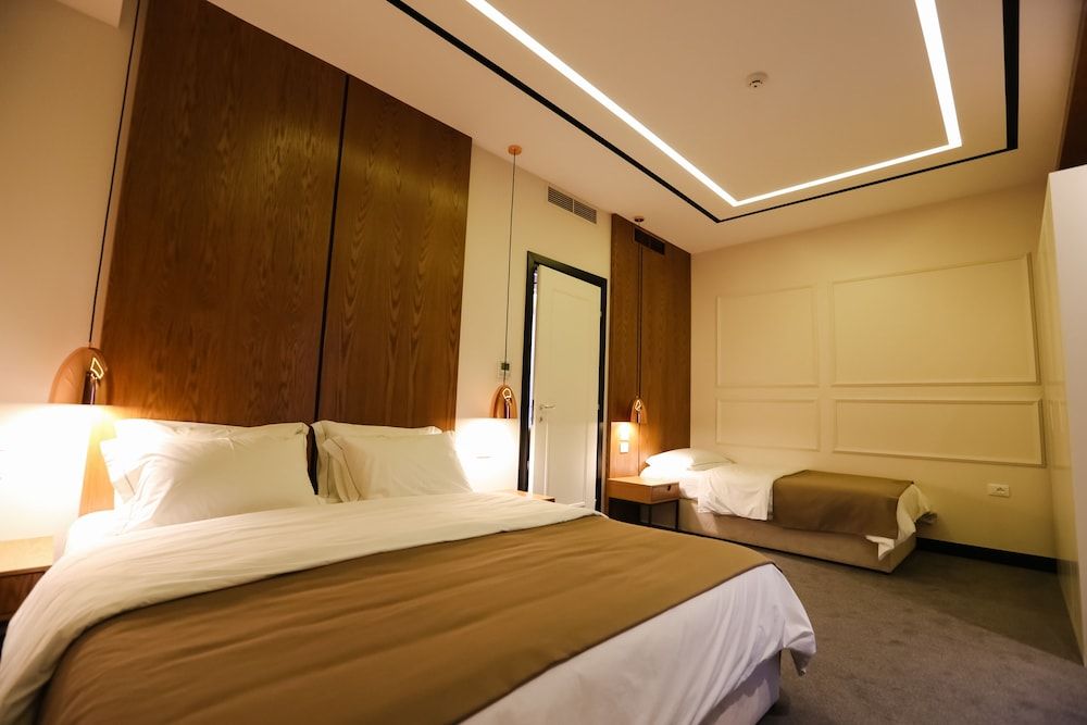 Delta Hotel Family Comfort Suite with Double Bed, Single Bed, and Living Area