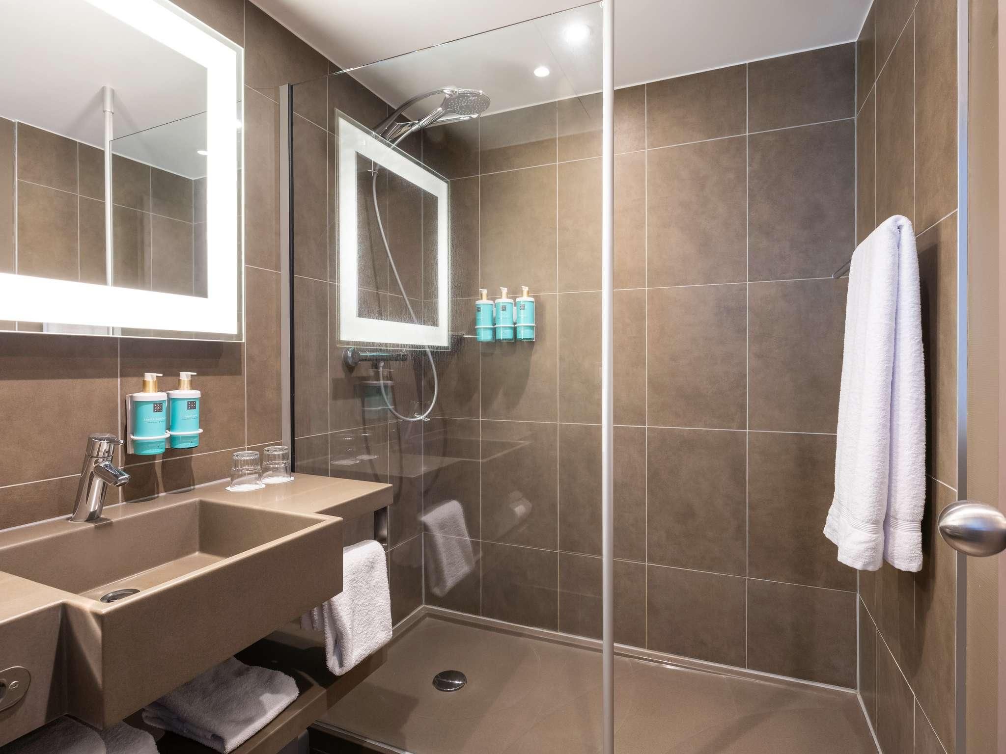 Superior room with 1 double bed and 2 sofa beds