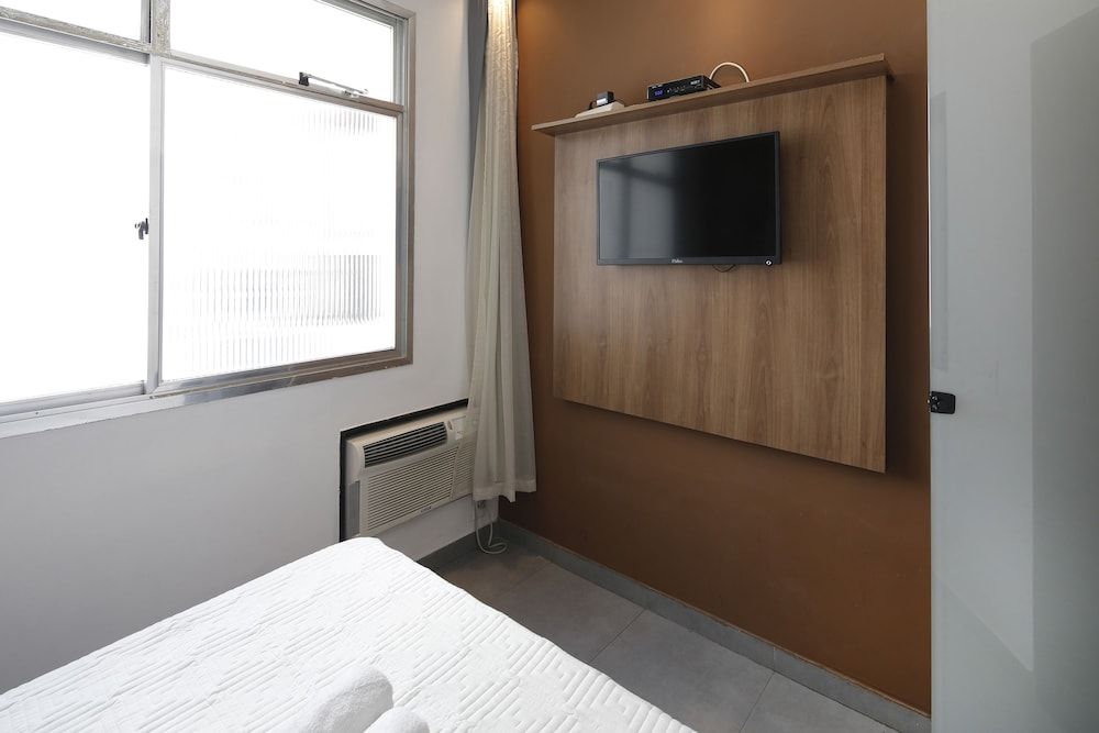 undefined Rio Rentals 021- C047 Studio na quadra da praia com máquina 10