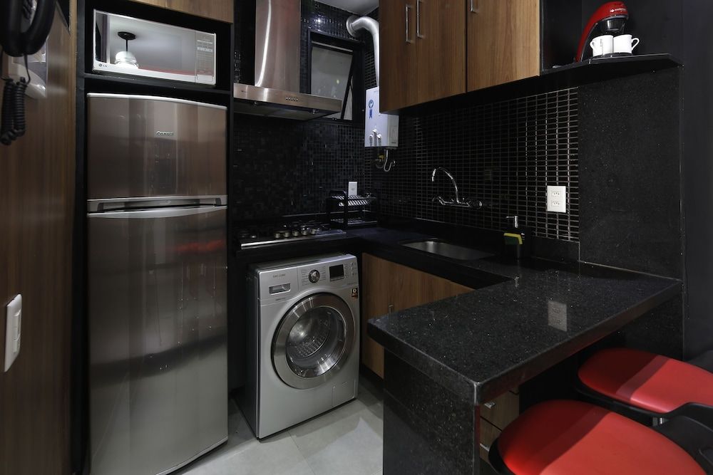 undefined Rio Rentals 021- C047 Studio na quadra da praia com máquina 8