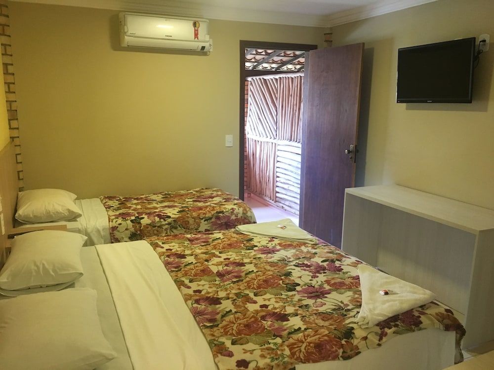 Pousada Latitude Quarto Vista Broadway 5