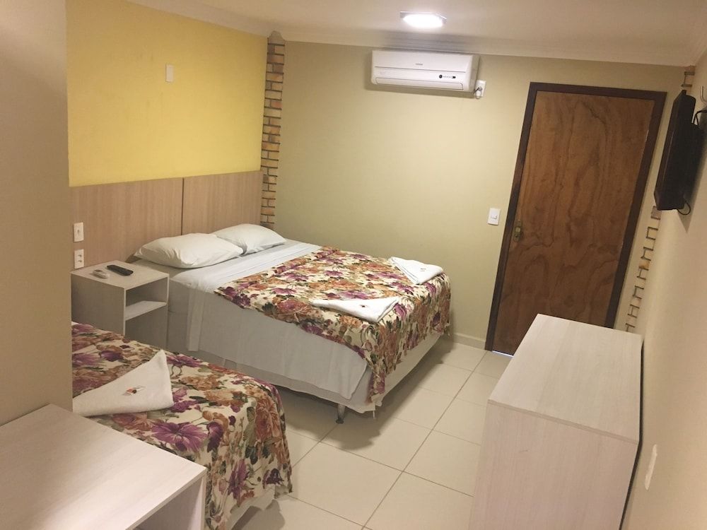 Pousada Latitude Quarto Vista Broadway 3