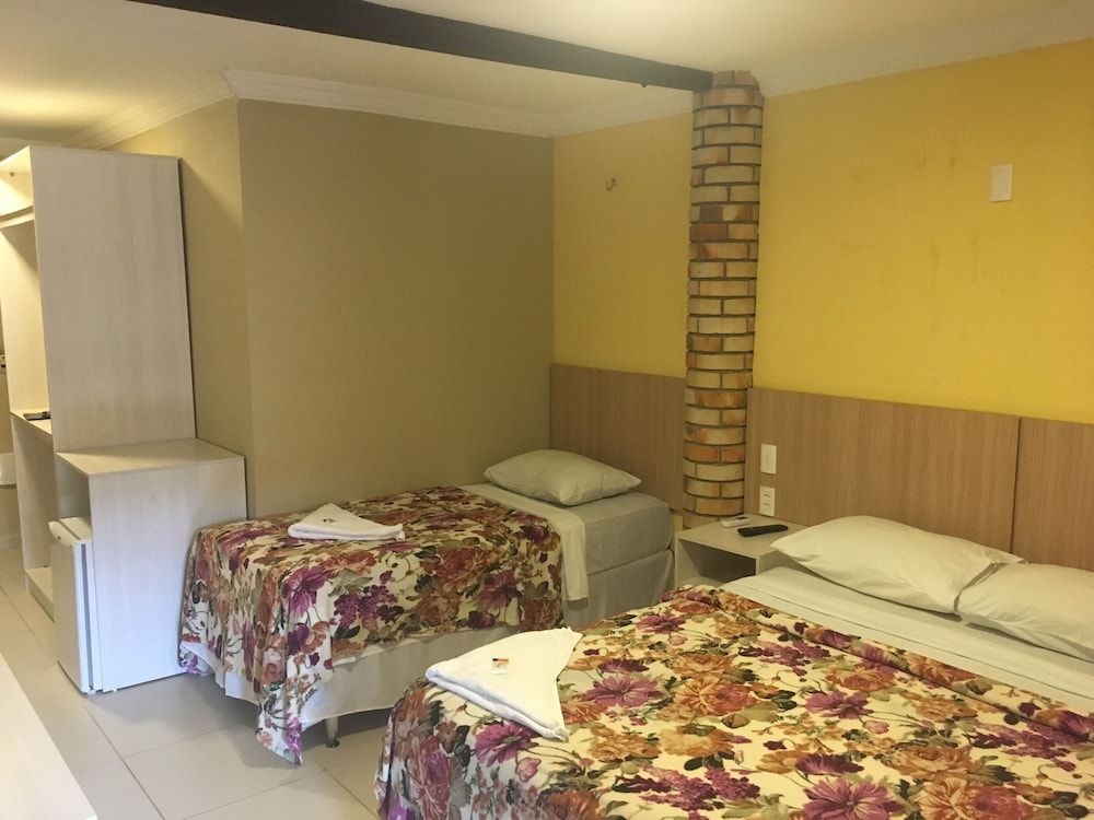 Pousada Latitude Quarto Vista Broadway 4