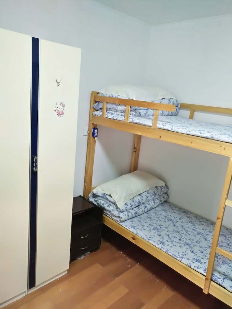 Bed in Weekly Economy Room