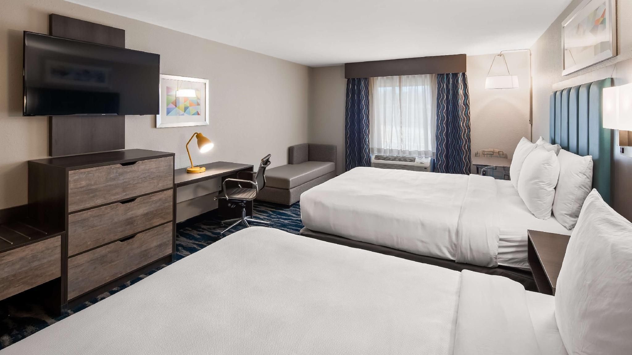 Suite-2 Queen Beds, Non-Smoking, One Bedroom, 50 Inch Flat Screen Television, Kitchenette, Full Brea