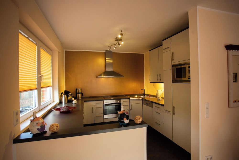 Hotel Am Sportpark Deluxe Apartment, 1 Bedroom, Kitchen, Courtyard View 12