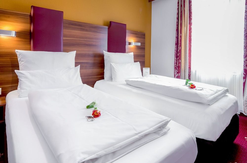 Hotel Burgschmiet Quadruple Room