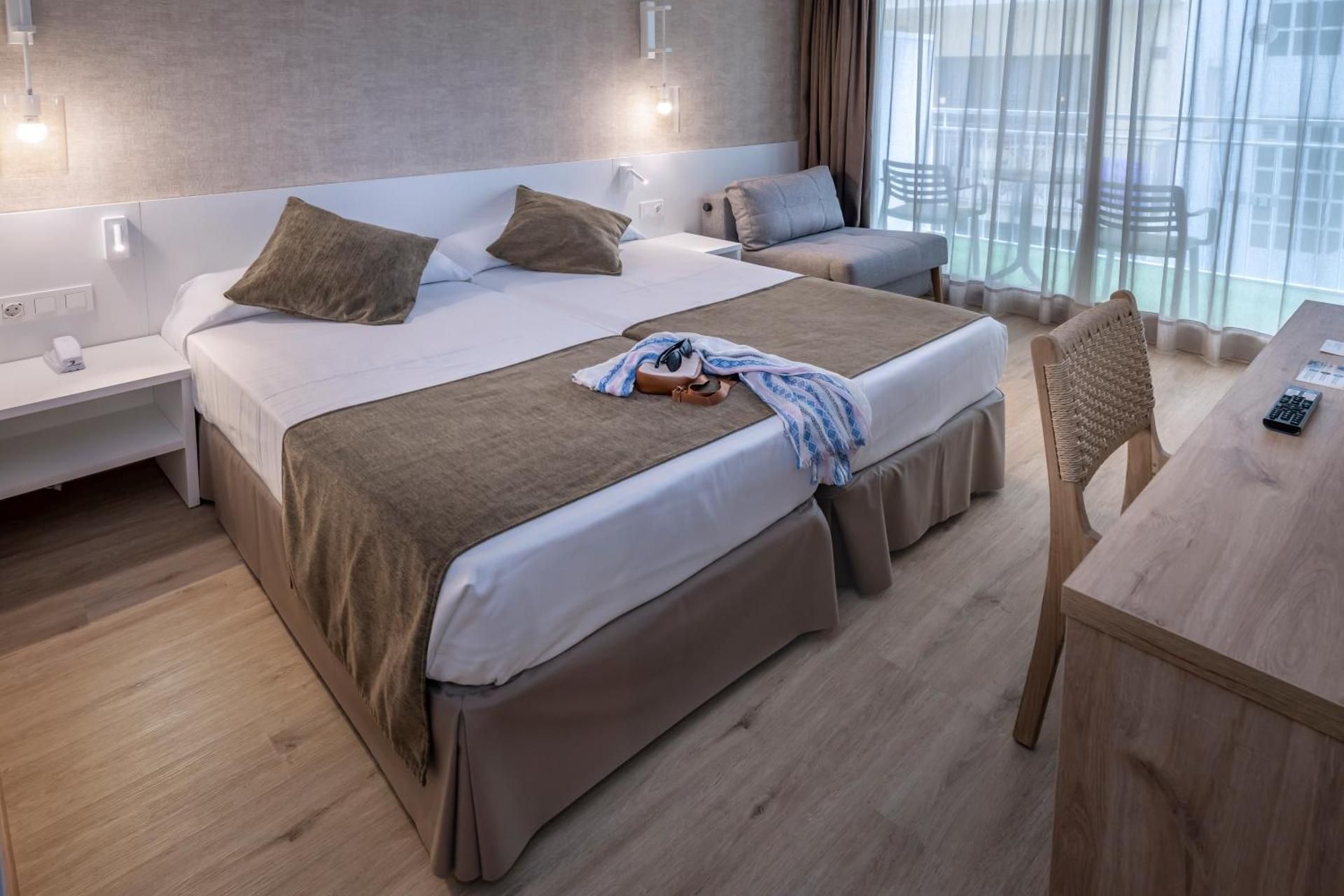 Twin Room with Extra Bed and Balcony (2 Adults + 1 Child)