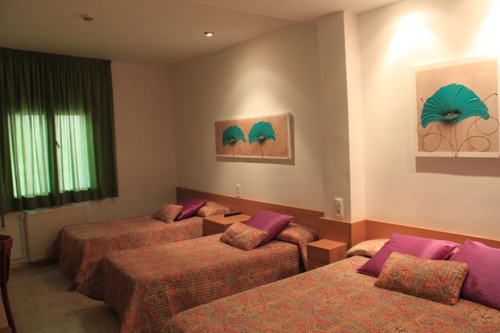 Hotel Pinxo Quadruple Room 6