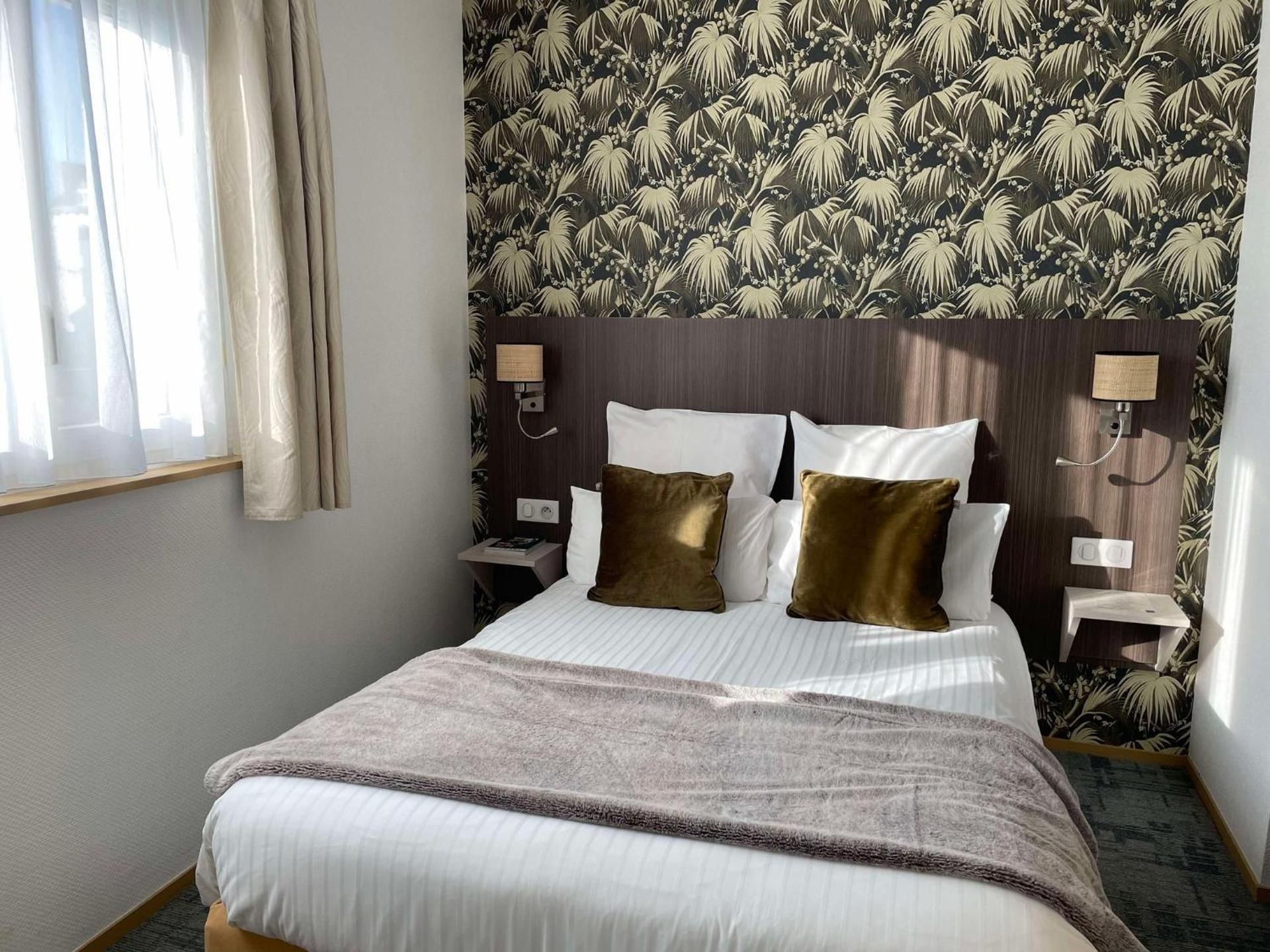 Triple Room (1 Double Bed + 1 Single Bed)