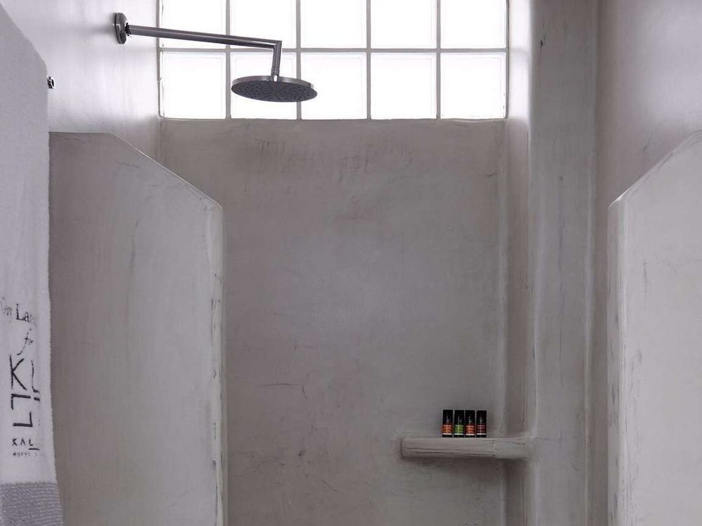 Kalisti Hotel & Suites Elegant White Deluxe Room with Private Balcony 6