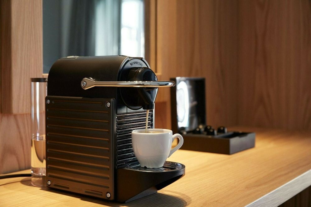 Kalisti Hotel & Suites Elegant White Deluxe Room with Private Balcony 9