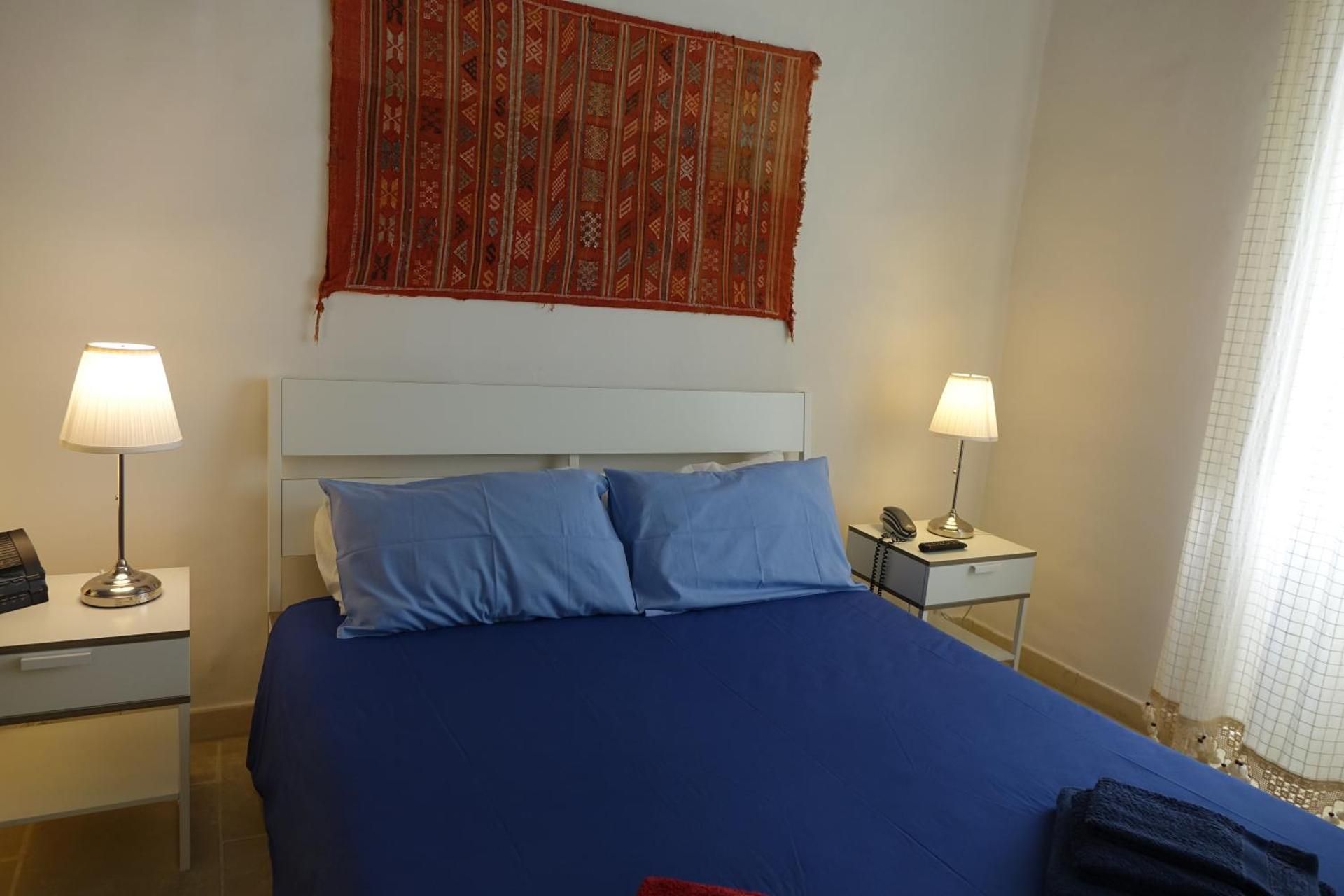 Queen Room with Shared Bathroom