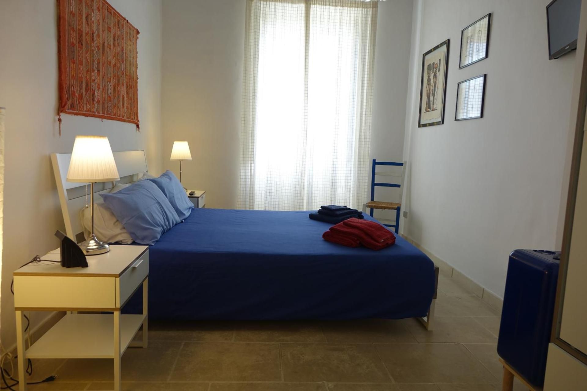 Queen Room with Shared Bathroom