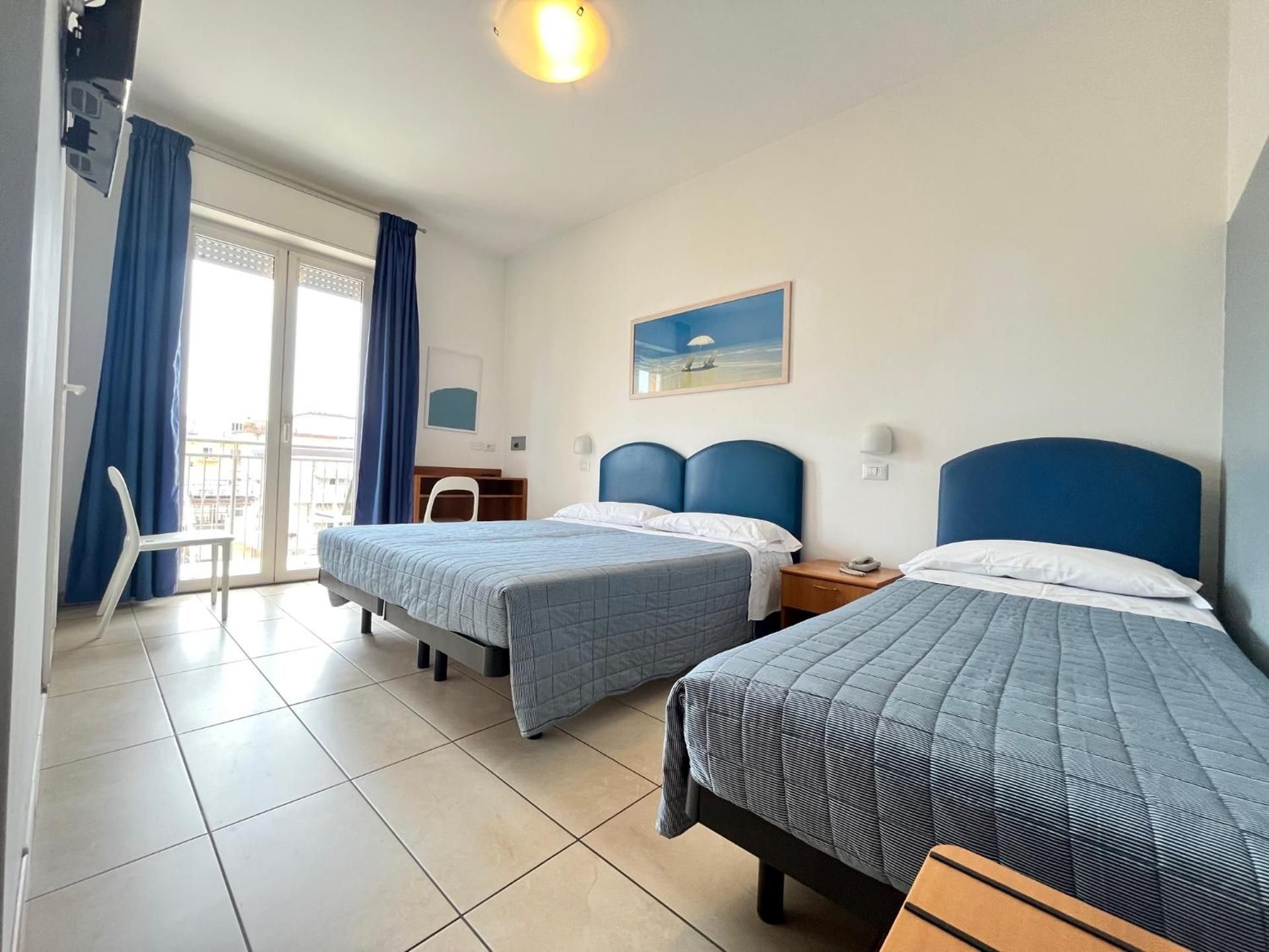 Standard Triple Room with Balcony