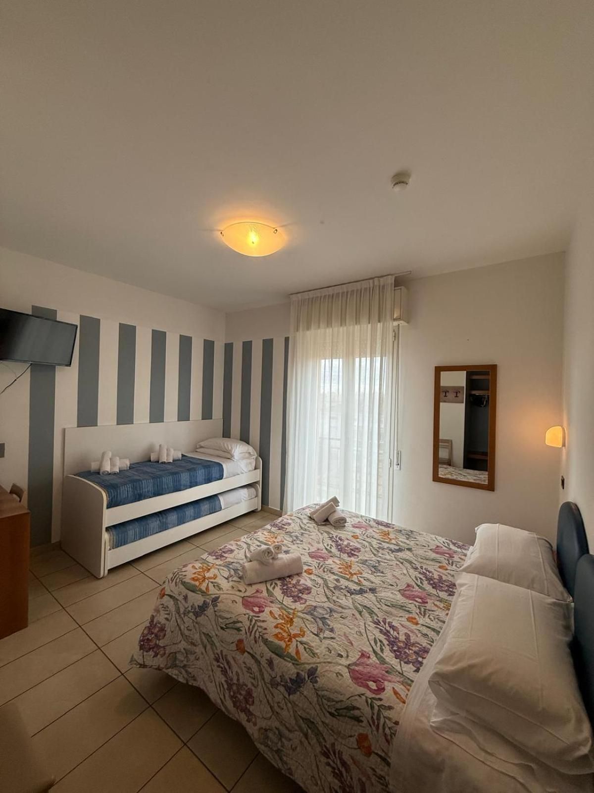 Standard Quadruple Room with Balcony