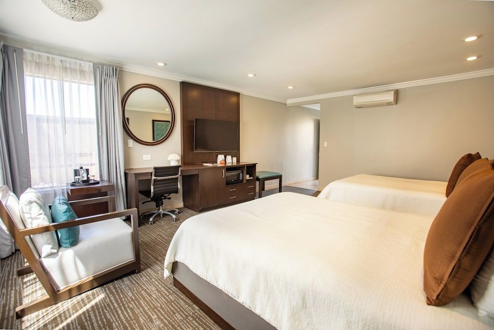 Munras Inn Room, 2 Queen Beds, Non Smoking, Fireplace 3