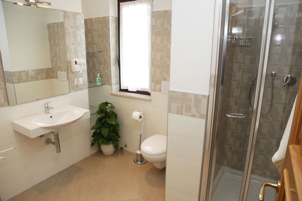 Deluxe Quadruple Room, Garden View