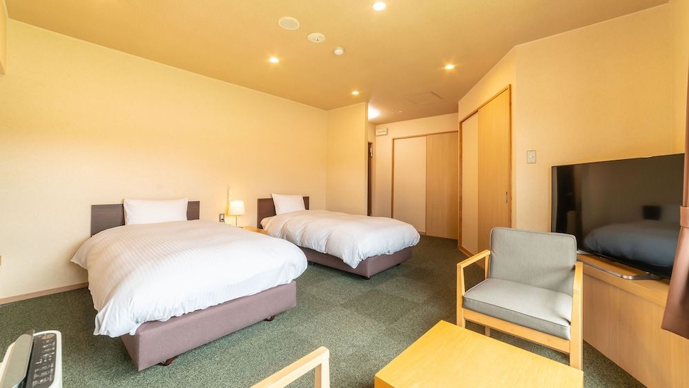 Standard Twin Room - Shared Bathroom - Non-Smoking