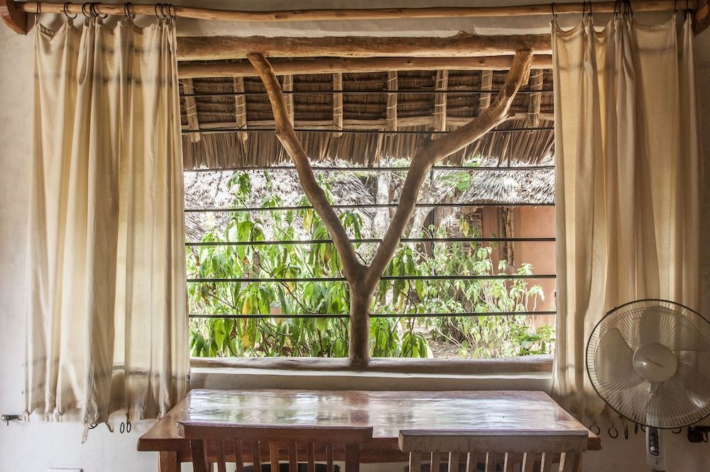 Distant Relatives Ecolodge & Backpackers Comfort Quadruple Room