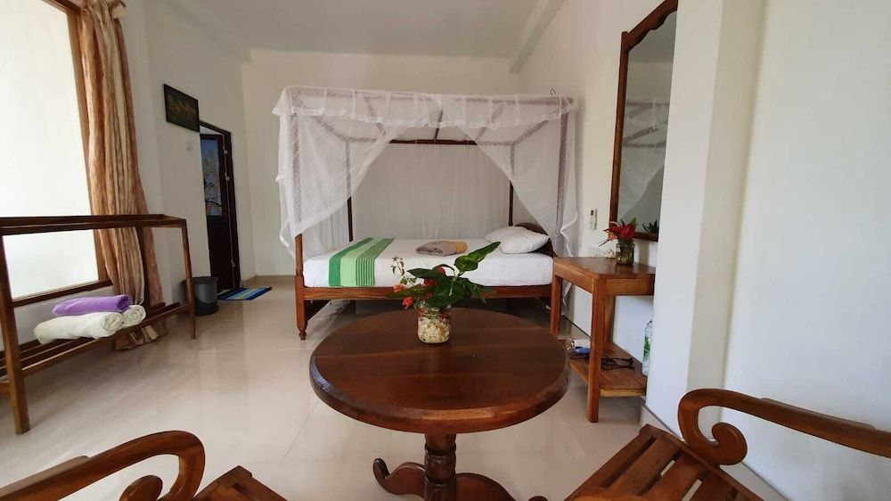 Turtle Paradise Deluxe Double Room, 1 King Bed, Garden View, Ground Floor 3