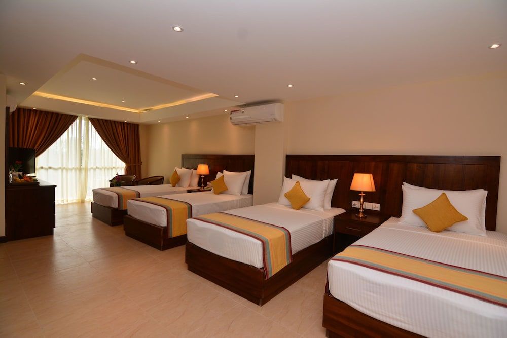 Grand 103 Deluxe Quadruple Room