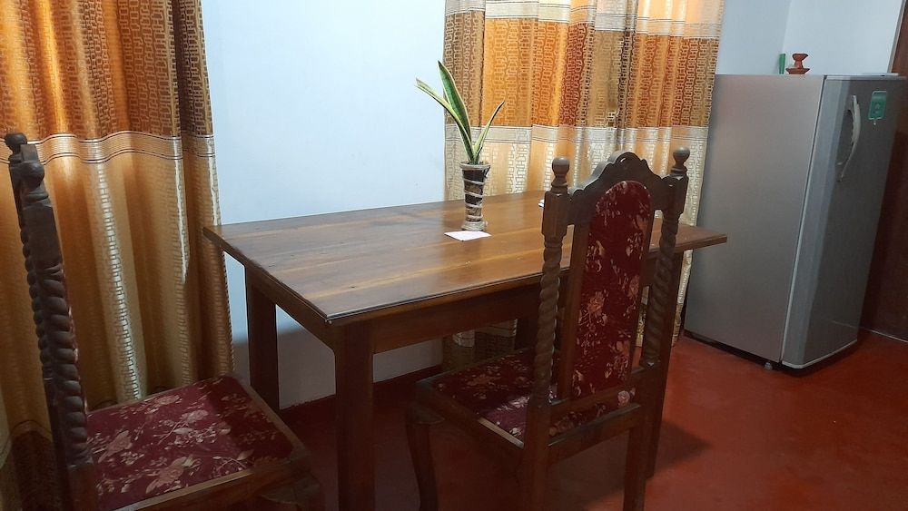 Ranmitha Villa Deluxe Triple Room, 1 Bedroom, Kitchen, Garden View 9