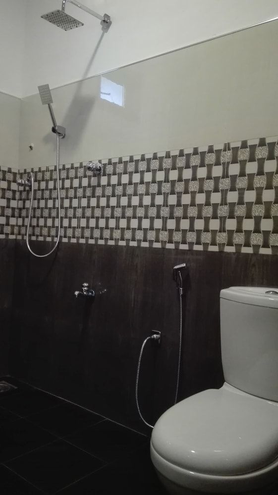 Ranmitha Villa Deluxe Triple Room, 1 Bedroom, Kitchen, Garden View 4