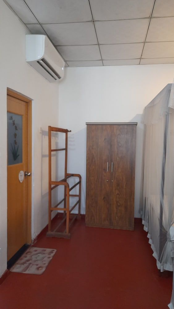 Ranmitha Villa Deluxe Triple Room, 1 Bedroom, Kitchen, Garden View 8