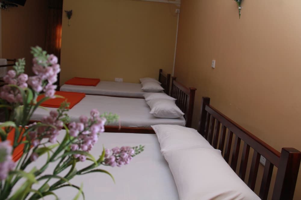 Anura Guest Inn Family Triple Room, 2 Bedrooms, Private Bathroom, Ground Floor 4