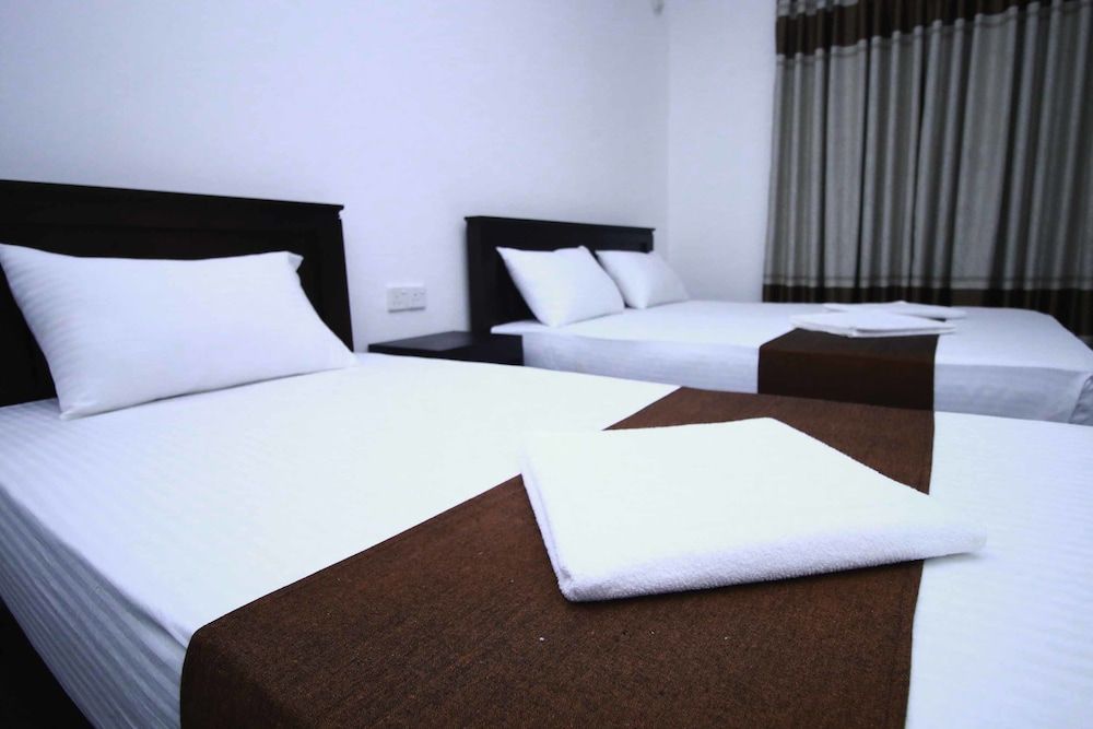 Yoho Bro Colombo 03 Deluxe Triple Room 6