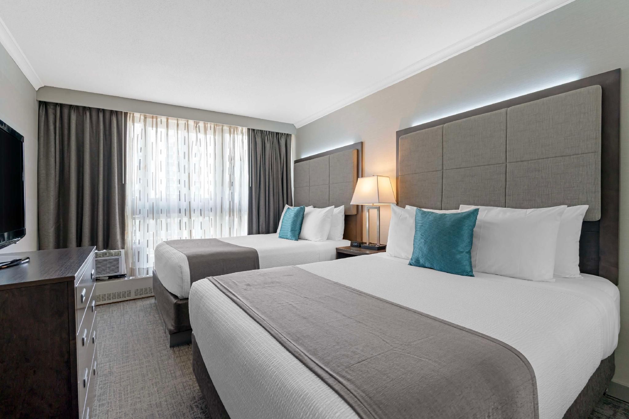 2 Queen Beds, Nonsmoking, Premium Floor, Balcony, Partial Ocean View, Upgraded Amenities