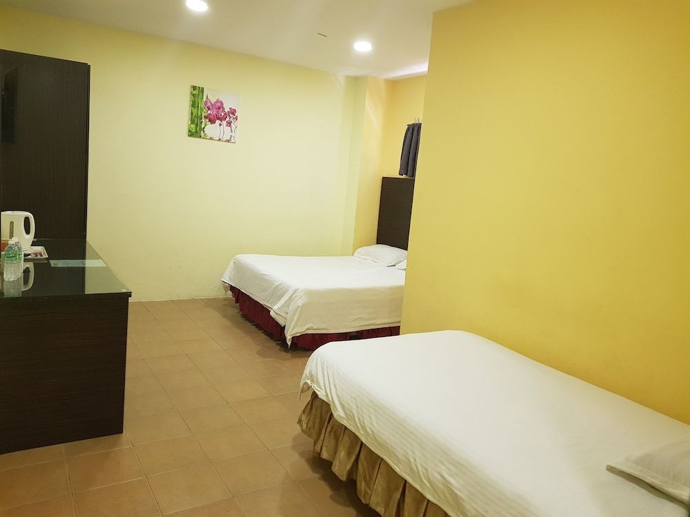 New City Hotel Family Triple Room