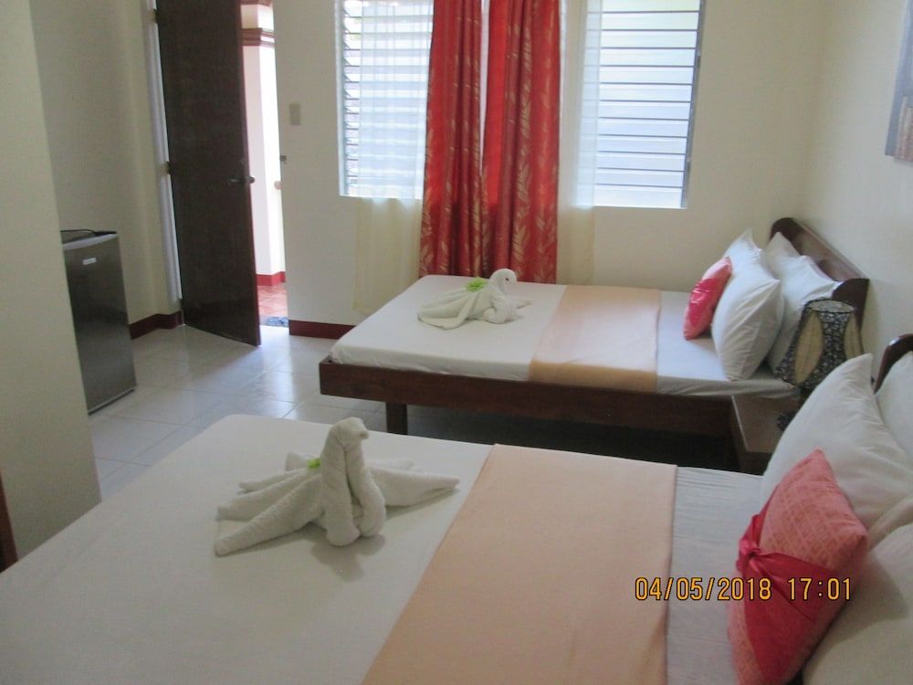 AGM Beachfront Resort & Resto Family Room 2