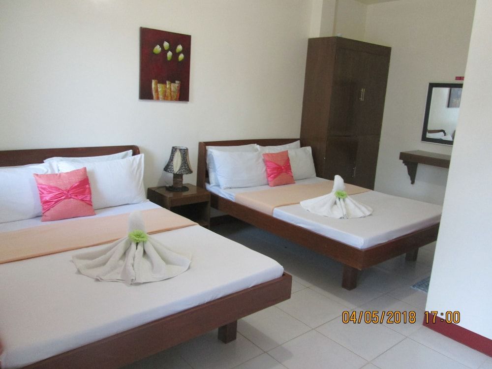 AGM Beachfront Resort & Resto Family Room