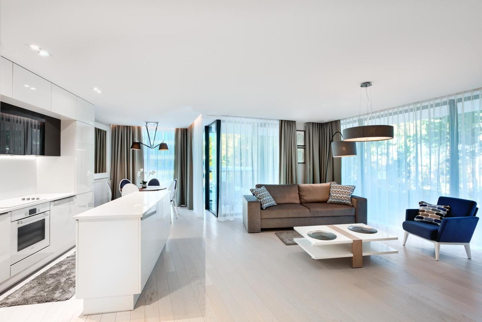 Two-Bedroom Apartment B119 with dunes and sea partial view
