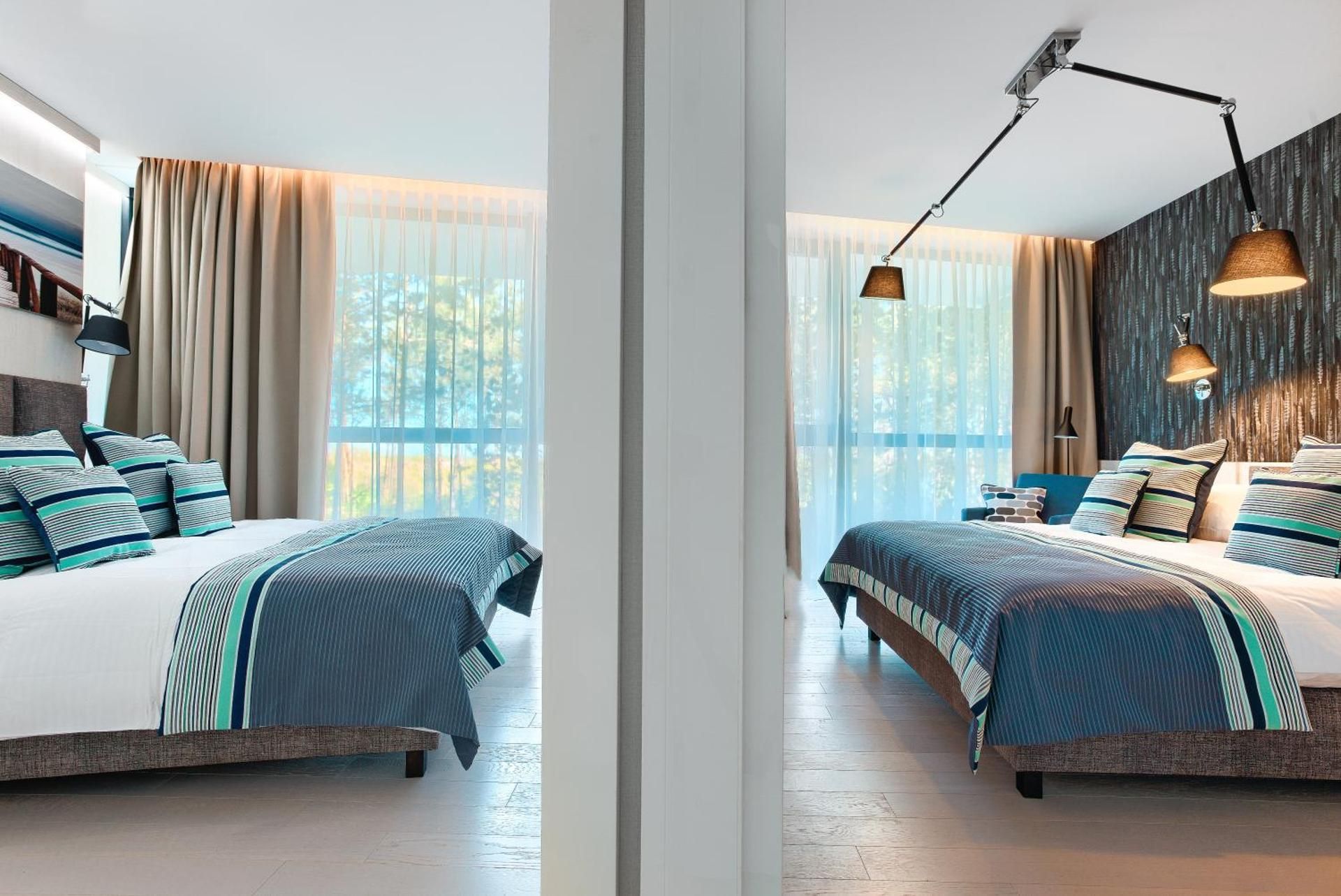 Two-Bedroom Apartment B119 with dunes and sea partial view