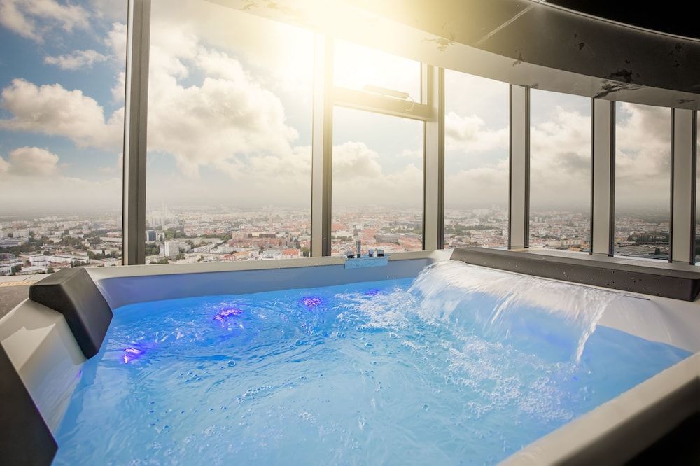 Apartments in Sky Tower with Bathtub near the window