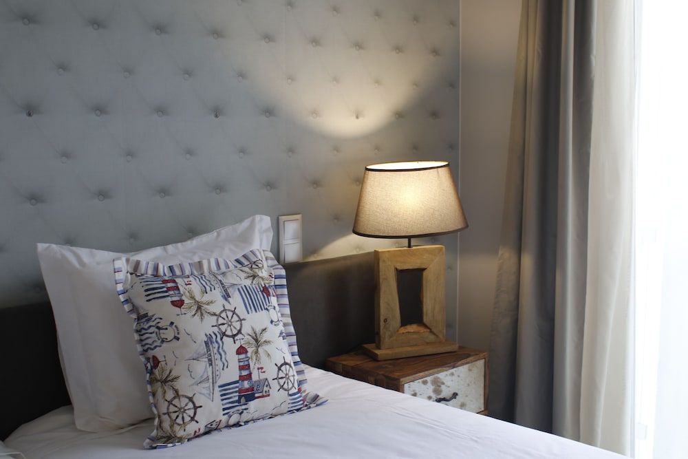 Royal Beach Hostel & Suites Triple Room