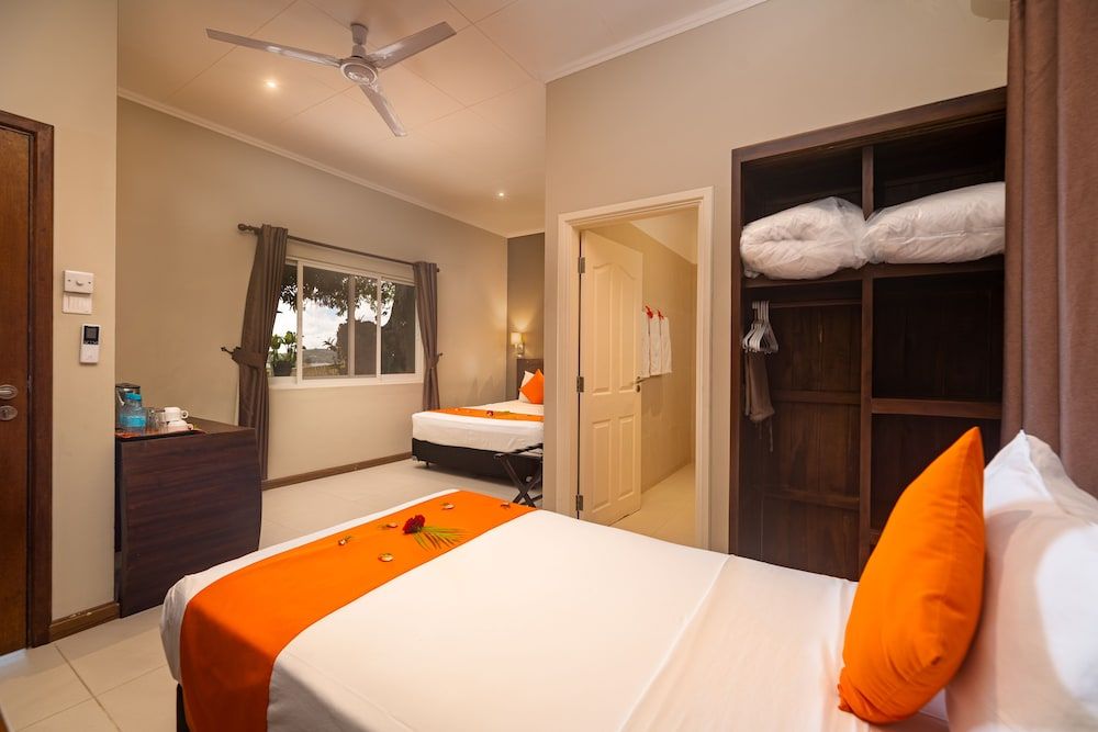 The Ridge Residence Deluxe Triple Room 3