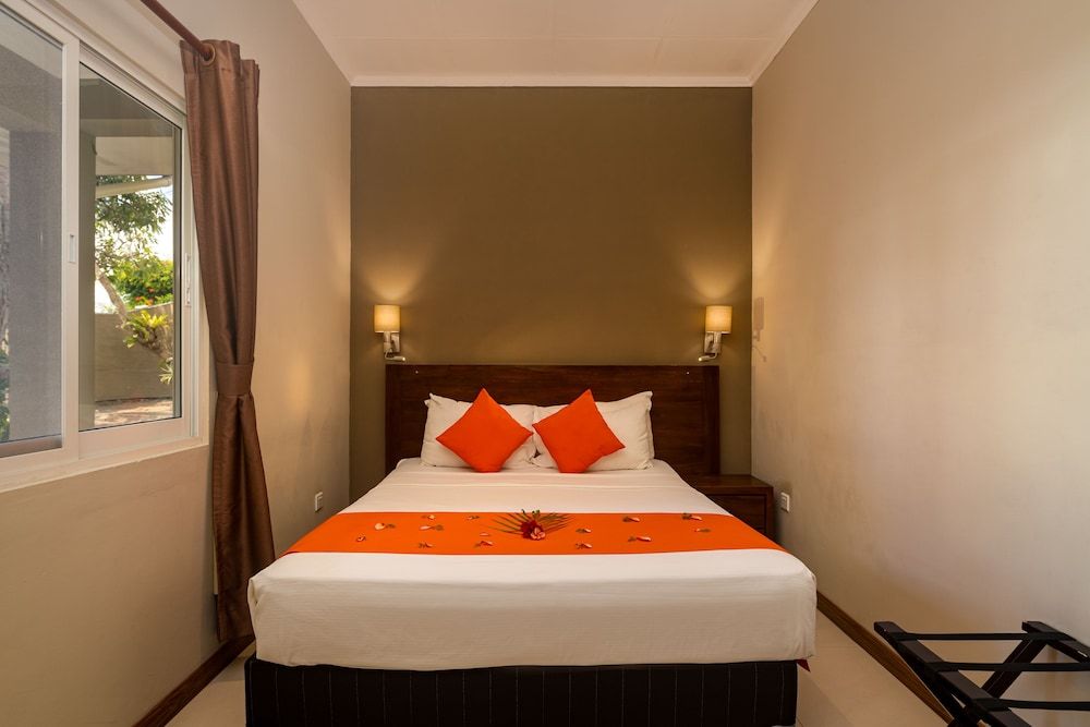 The Ridge Residence Deluxe Triple Room