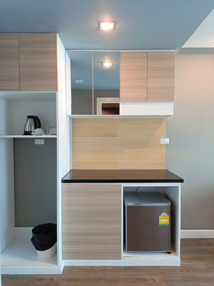 Wisdom Hotel & Residence Triple Room 5