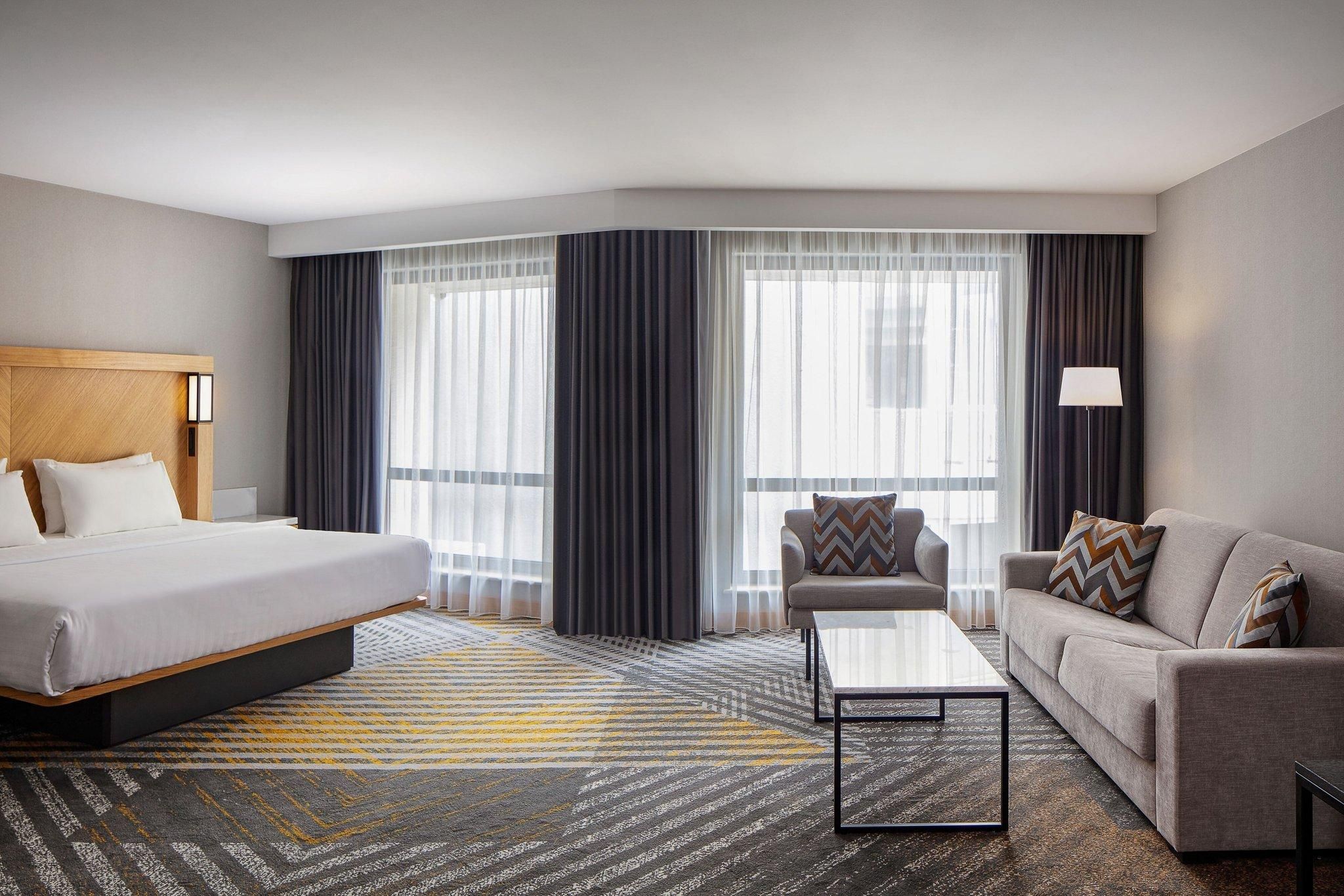 corner king room, larger guest room, 1 king, corner room, pool access