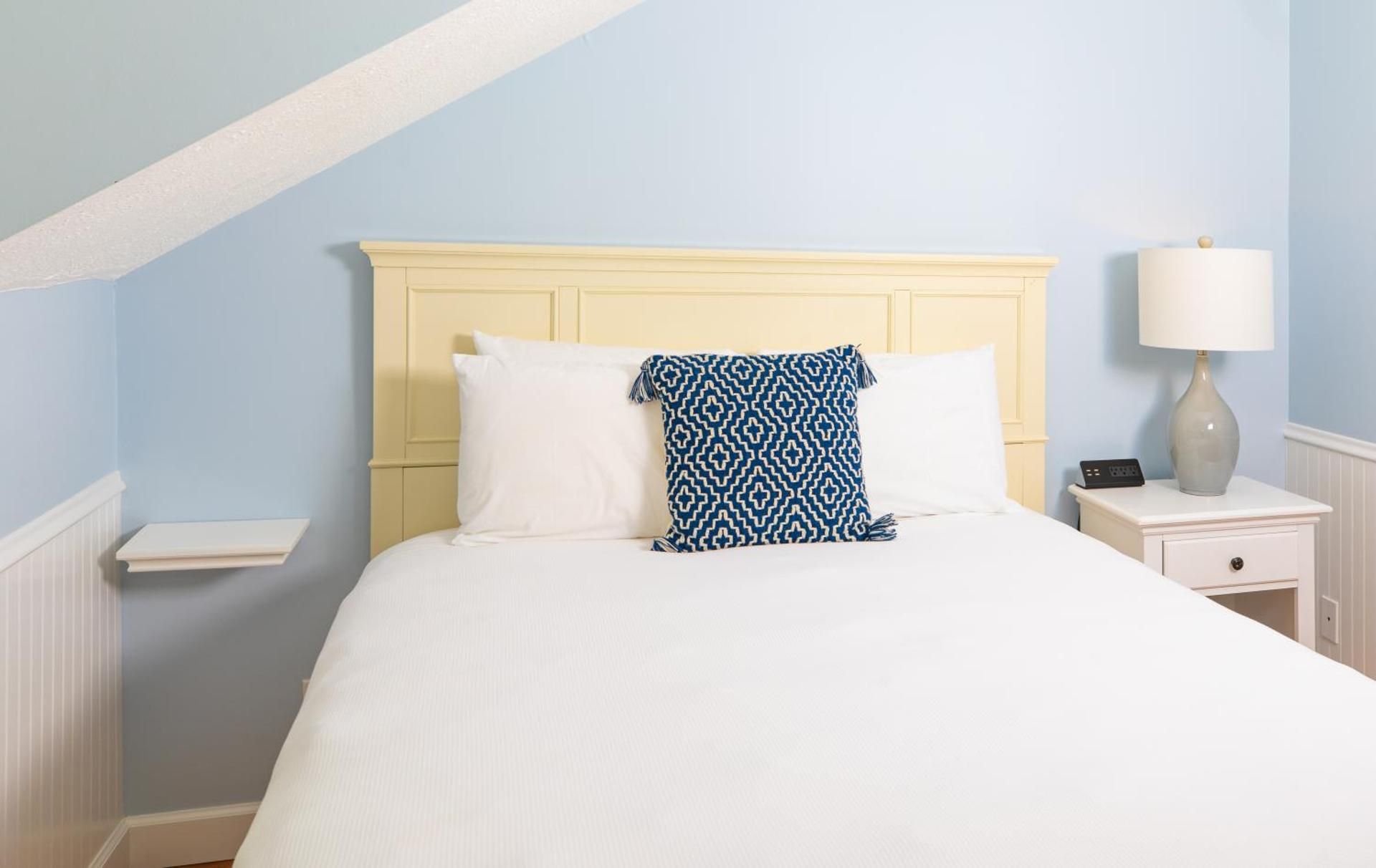 Economy One Queen Bed, Stairs Required, Dormered