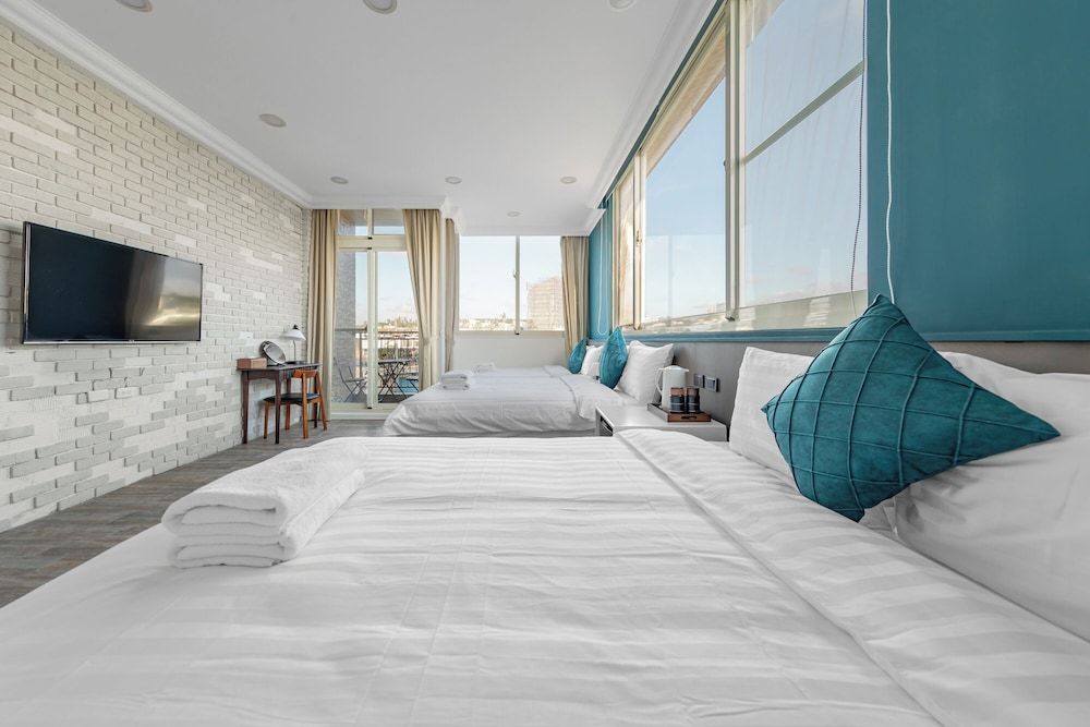 Sunset Mu Style Inn Family Suite with Balcony 7